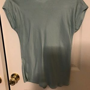 Green crew neck blouse.